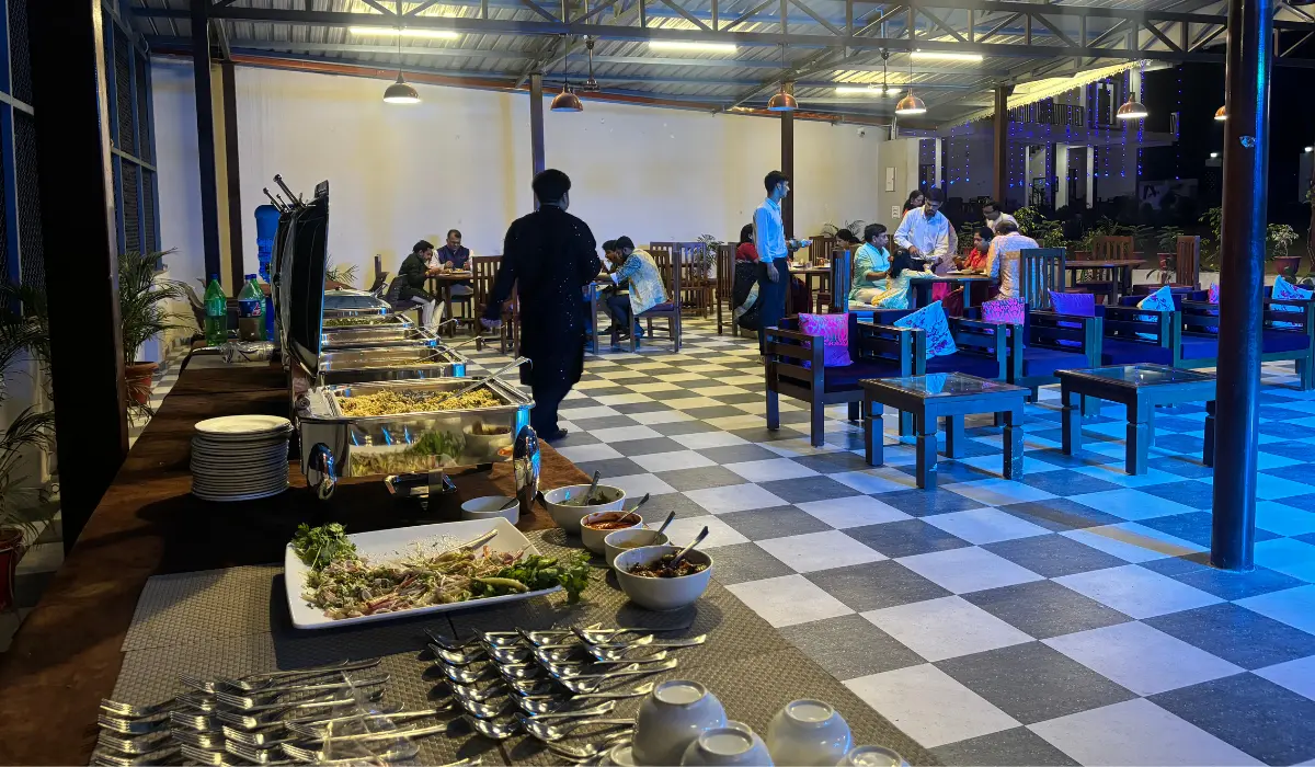 Professional dining service at the best wedding resort in Dehradun – Pristine Woods offers elegant outdoor dining setup for wedding guests and events