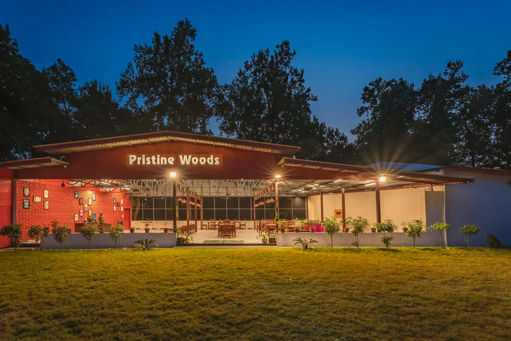 Restaurant at Pristine Woods Resort in Dehradun offering buffet and à la carte dining with local and international cuisine in a serene nature setting