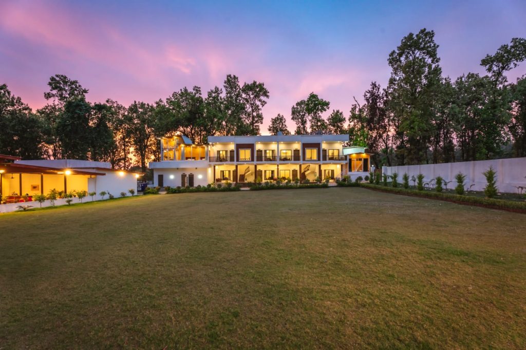 Best resort near Ecole Globale Dehradun with luxury rooms, lawn and forest surroundings in Sahaspur